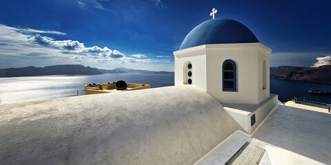 Oia Church roof and Dome above the sea © billbohemia