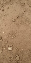 Fototapeta premium Rough and gritty dirt texture with natural earthy tones, dirt, natural