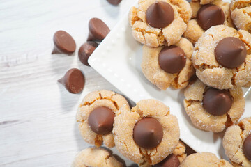 Peanut Butter Blossom cookies freshly made and ready for a cup of milk.  Baking Peanut Butter...