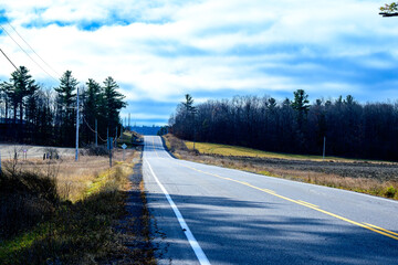 road in the countryside in autumn shot in the ottawa valley ontario canada room for text