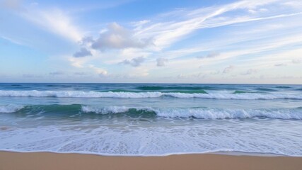 Obraz premium Beautiful cloudscape over sea and beach with gentle waves on sand, peaceful, tranquil