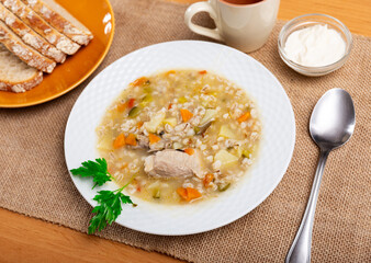 National Russian dish is Pickle soup with meat, cooked on the basis of pickled cucumbers and pearl...