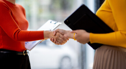 Businesswoman handshake and business people. Successful business handshake concept.
