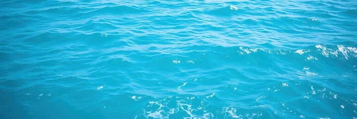 Naklejka premium A mesmerizing ocean background with clear blue waters and rolling waves, calming, ocean