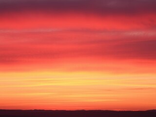 Obraz premium Vibrant gradient of pink, orange, and purple hues blending together in a beautiful sunset display, colorful, landscape