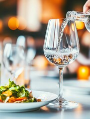 Refilling Water Glass Elegant Dining Photography with Attentive Service
