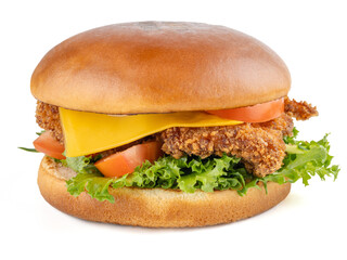 Hamburger with chicken strips, fresh vegetables and cheddar cheese. Brioche bun. Close-up. Isolate. White background.