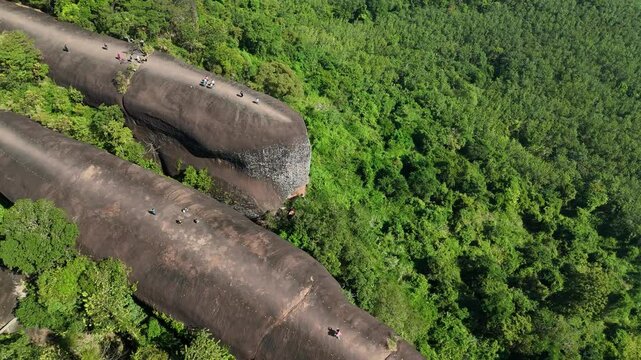 Aerial view of an iconic Three Whales Rock (in Thai called Hin Sam Wan) a 75-million-year-old rock formation protruding out of a mountain in Phou Sing, Bueng Kan Province, Thailand.