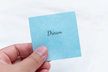 Handwritten note of a dream close-up inspirational content minimalist environment personal viewpoint motivation concept