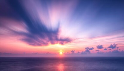 Obraz premium Stunning Ocean Sunset with Colorful Sky and Wispy Clouds at Dusk