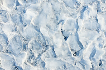 Obraz premium Aerial View of Frozen Winter Water Surface