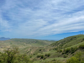 Beautiful scenery from the top of the mountain to the green forest on the journey