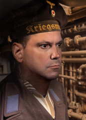 A portrait of a sailor in period uniform from World War II