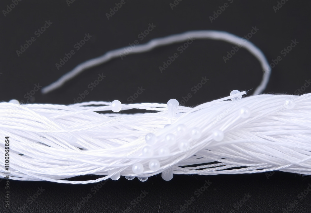 Poster beading thread a strong and flexible thread used for stringing beads and creating intricat