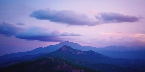 Fototapeta premium Gentle clouds drifting Distant mountain range Time-la