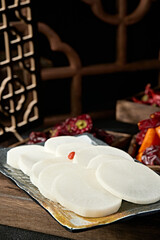 A plate of fresh white radish slices