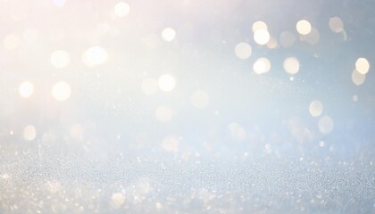 Obraz premium Silver background with glitter and bokeh lights, ideal for holiday cards and wallpapers