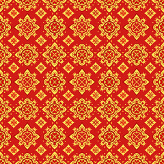 Red and Gold Floral Pattern: A luxurious seamless textile design featuring intricate floral motifs in vibrant red and gold hues.