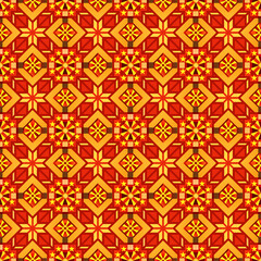 Fototapeta premium Red and Gold Geometric Pattern: A vibrant, repeating design featuring intricate geometric shapes in shades of red, gold, and orange. Perfect for textile design, wallpaper, or web backgrounds. 