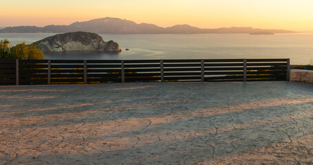 cgi backplate production.Concrete parking lot with railings and view of islands and sea