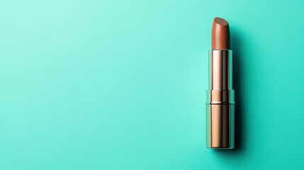 Obraz premium Shimmery Bronze Lipstick on a Turquoise Background