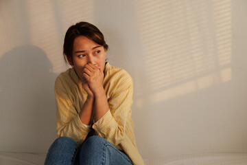 Depressed young asian woman with mental health problem in mind need crucial treatment from...