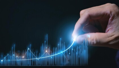 A hand adjusting a glowing graph to illustrate growth and progress.