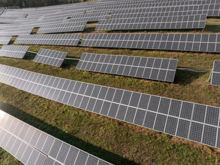 Rows of Photovoltaic Panels. Compose Renewable Energy. Drone Point of View. Solar Power Station...