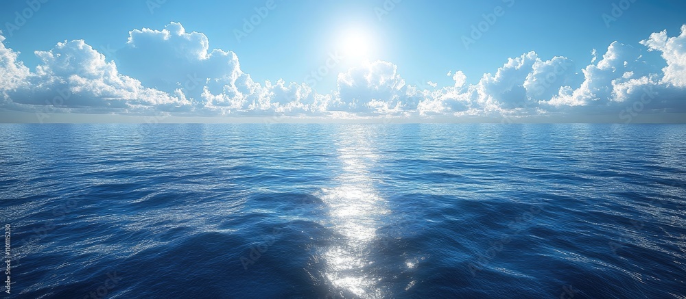 Poster expansive ocean view under a clear blue sky with sunlight reflecting on calm water and fluffy clouds