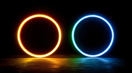 Two glowing circles, one orange and one blue, set against a dark background, create a striking visual contrast.