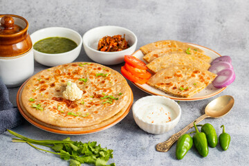 Gobi paratha is a popular Indian flatbread stuffed with spiced cauliflower, served warm with yogurt, pickles, or chutney.