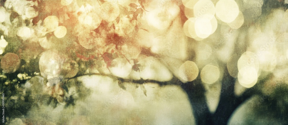 Poster vintage bokeh lights on a tree with soft colors creating a serene and celebratory atmosphere perfect