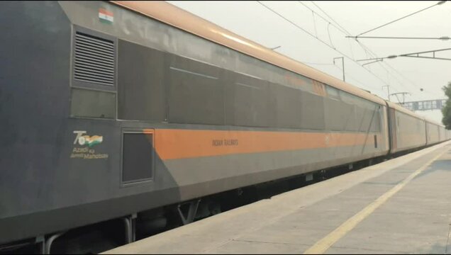 Delhi, India, November 02 2024 - Indian railway express train at departure from Anand Vihar railway station during morning time, Colourful Express train at Delhi railway station