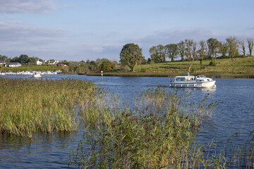 River Shannon with boat in Summer