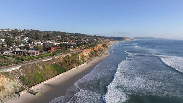 Aerial view of Del Mar coastal bluffs and Pacific ocean surf