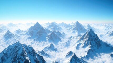 Obraz premium A breathtaking view of snow-capped mountains under a clear blue sky.