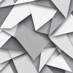 Obraz premium An abstract pattern of overlapping gray geometric shapes creating a textured backdrop.