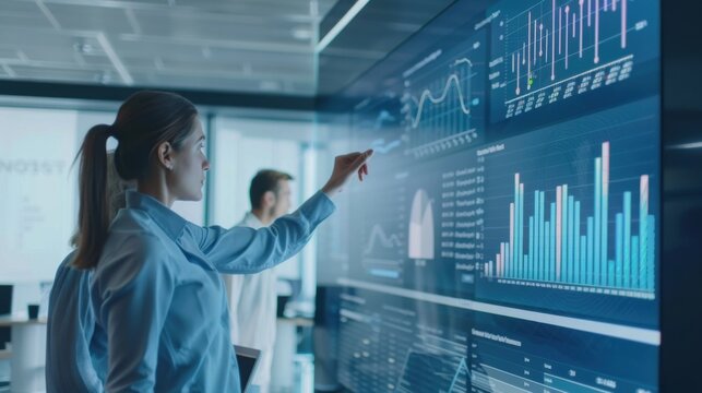 A business team reviewing project milestones and deliverables on a large screen in a modern workspace, The setting includes project timelines, performance metrics