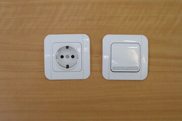 electrical outlet on white wall