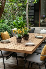 Fototapeta premium Outdoor wooden table, yellow flowers, place settings.