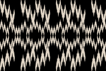 Ikat geometric folklore ornament. Tribal ethnic texture.Seamless striped pattern in Aztec style. Motifs Ikat embroidery abstract design for texture, fabric, clothing, wrapping, decoration