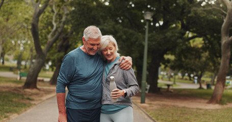 Outdoor, park and mature couple with fitness, hug and marriage with exercise and water bottle....