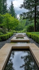 Fototapeta premium Zen retreat with stone pathway leading to a water basin, surrounded by pruned hedges and towering evergreen trees, creating a peaceful setting.