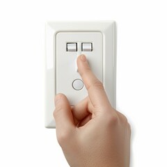 Hand turning on a light switch on a white wall, representing energy consumption, home automation, and electrical safety