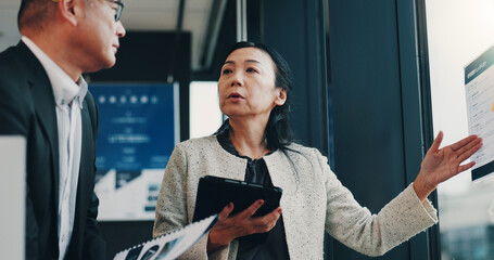 Asian, business people and presentation with tablet for company policy, schedule or planning at...