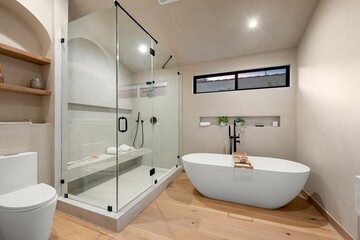 Modern bathroom with minimalist design and natural lighting.