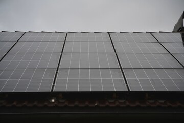 Energy-Efficient Home in Alpine Setting: Solar Panels on Roof