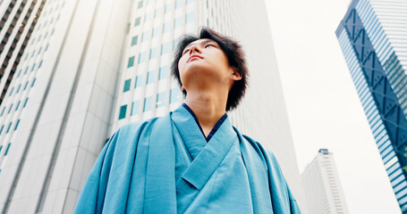 Japanese man, thinking and city travel with traditional clothes, outfit and yukata for heritage....