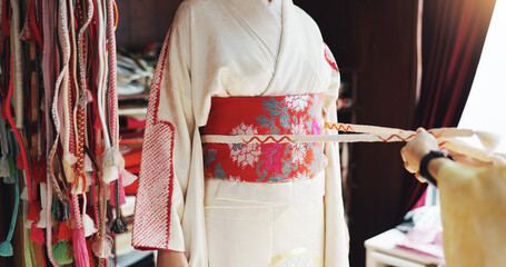 Kimono, belt and help with hands of people at tailor in japan for designer, boutique and fashion....