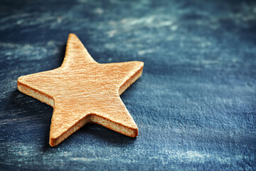 Rustic Wooden Star Christmas Ornament: A Closeup Image of a Simple, Handcrafted Holiday Decoration